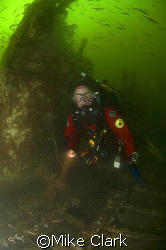 Diver on the wreck of the Unity,
Moray Firth, Scotland.
... by Mike Clark 